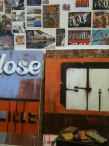 Picture of images on a wall and paintings reflecting the mood of those images.