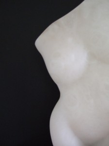 Alabaster human torso, with softened forms