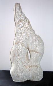 Coiled clay vessel with cracked glaze surface